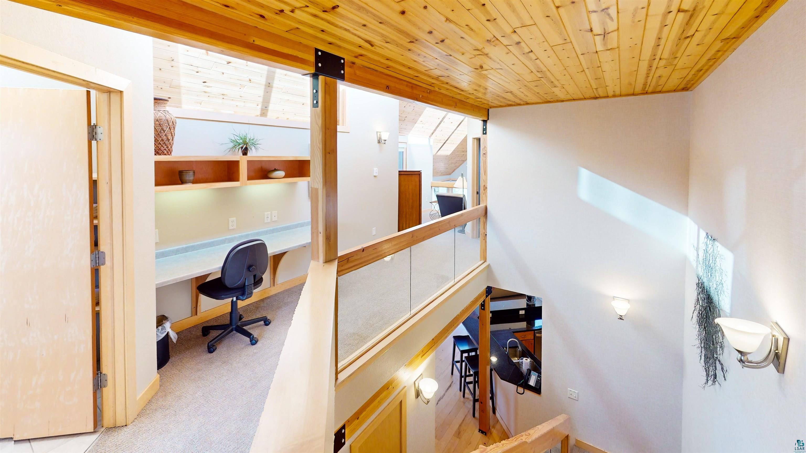 40 Surfside Drive, Unit 5D Tofte, MN 55615 - Photo 35 of 37 Custom built-in desk with integrated shelving and task lighting