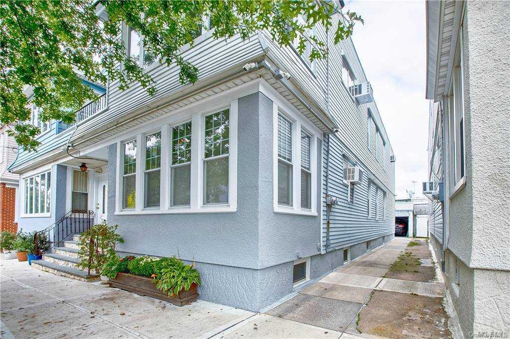 a view of a house with a small garden