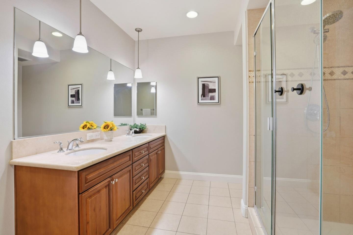 2881 Meridian Avenue, Unit 217 San Jose, CA 95124 - Photo 22 of 39 a bathroom with a sink vanity and a mirror