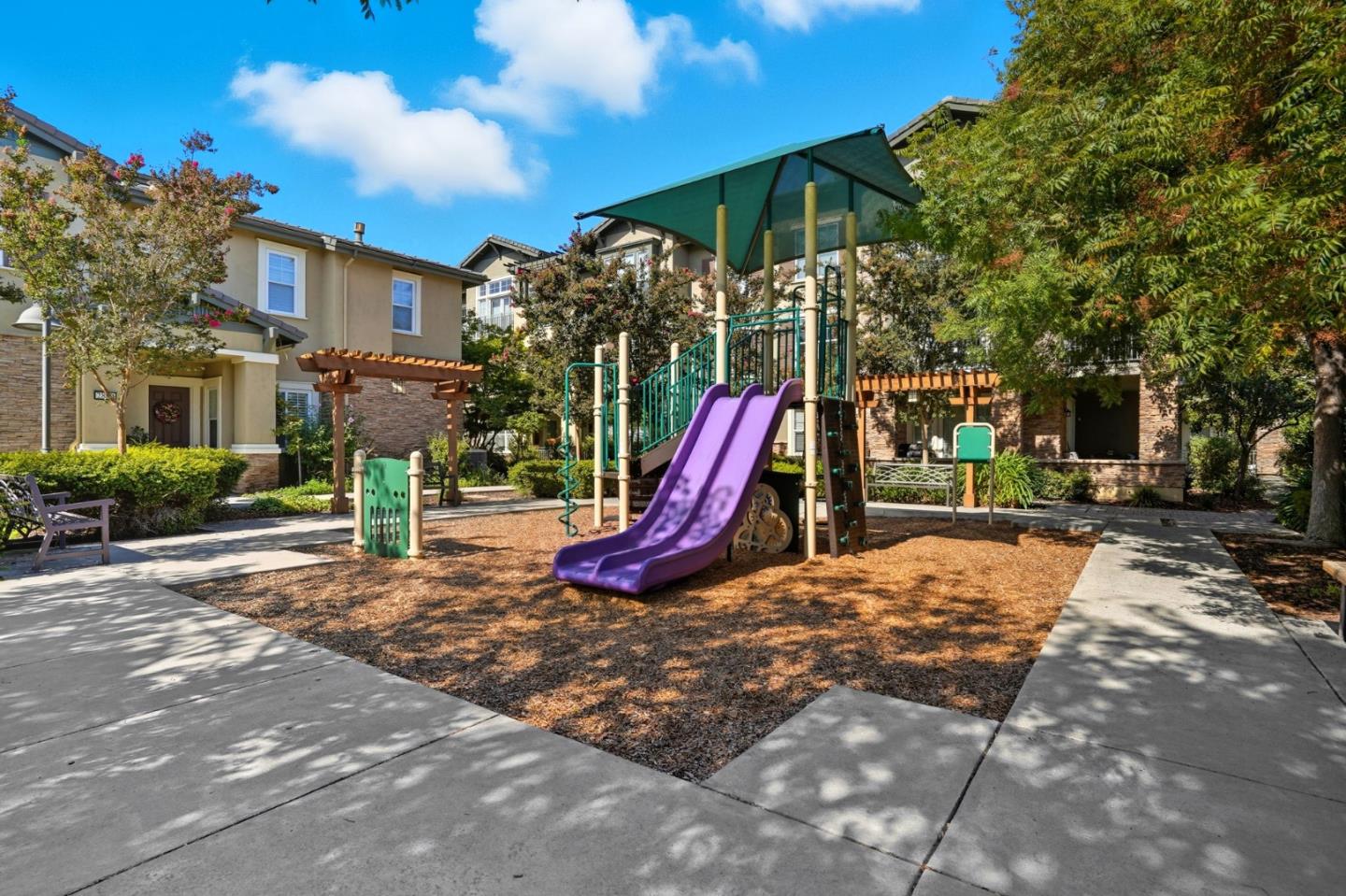 2881 Meridian Avenue, Unit 217 San Jose, CA 95124 - Photo 37 of 39 a view of a park with swings and slides