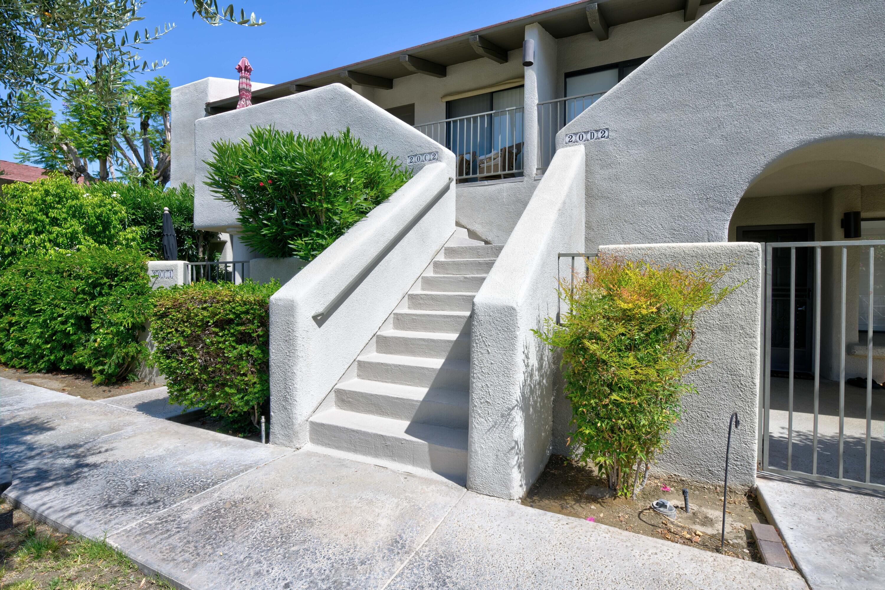 1150 East Amado Road, Unit 20C2 Palm Springs, CA 92262 - Photo 4 of 14 a view of a entrance of building