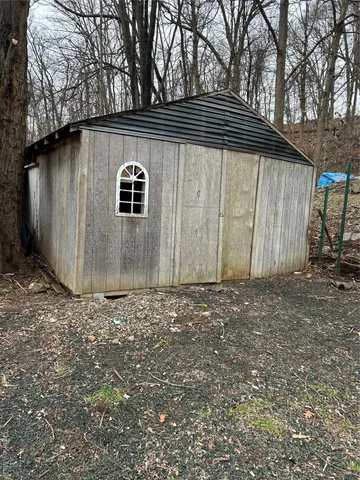 a view of a deck with a yard
