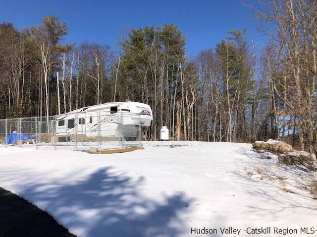 39 Travis Boulevard Catskill, NY 12414 - Photo 2 of 20 a view of white house with a snow yard