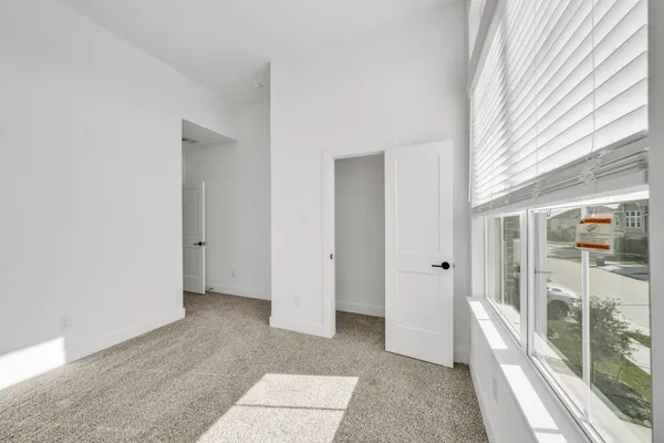 a view of a room with a balcony