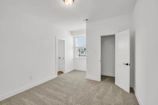 an empty room with closet