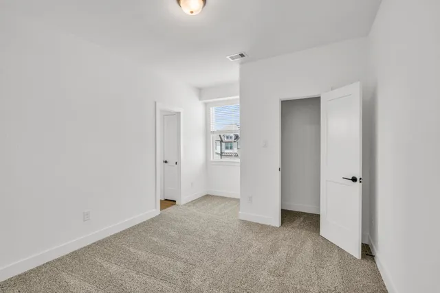 an empty room with closet