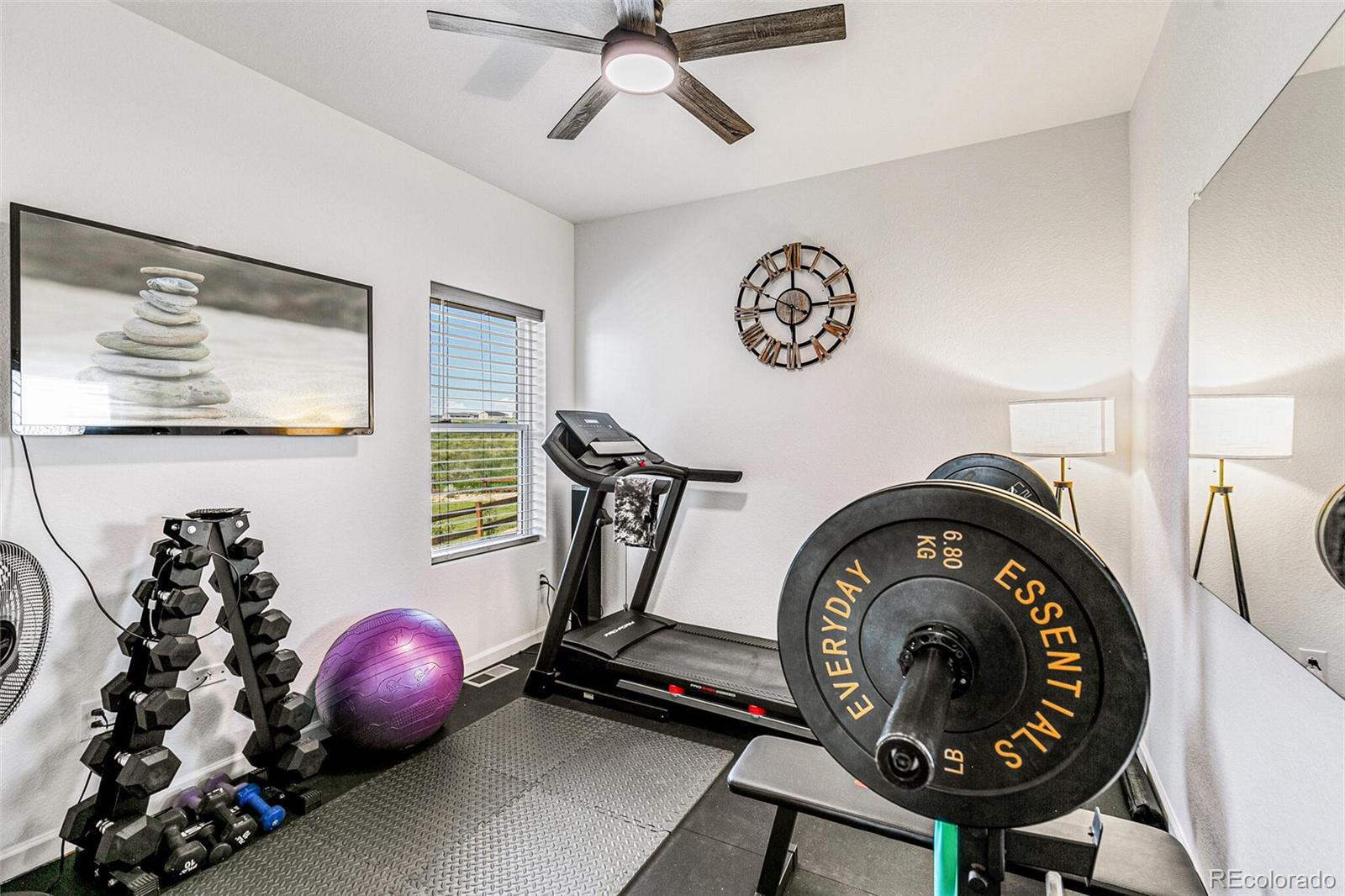 42891 Hawktree Circle Elizabeth, CO 80107 - Photo 16 of 39 a view of a room with gym equipment