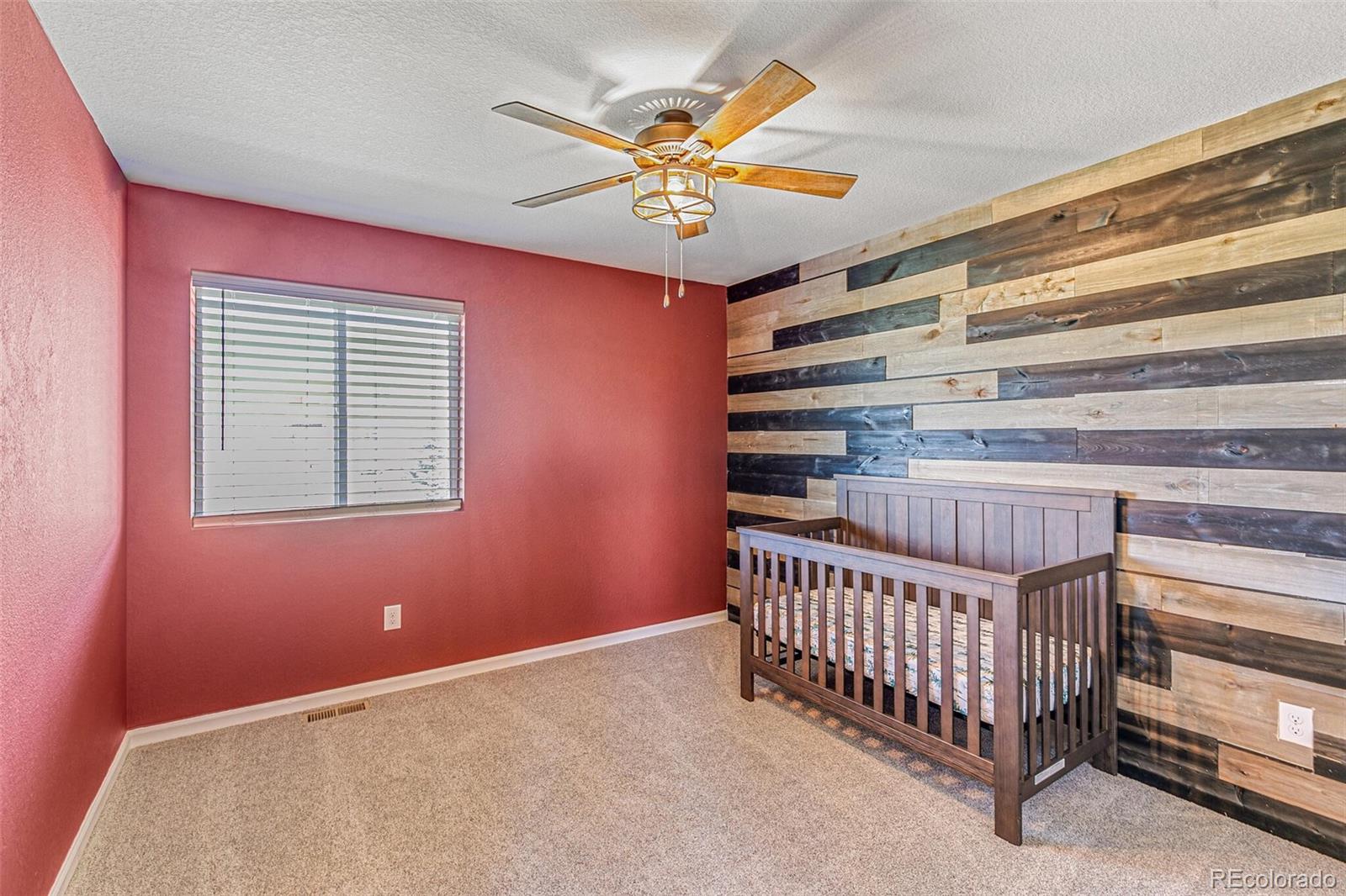 42891 Hawktree Circle Elizabeth, CO 80107 - Photo 26 of 39 a view of livingroom with stairs and stairs