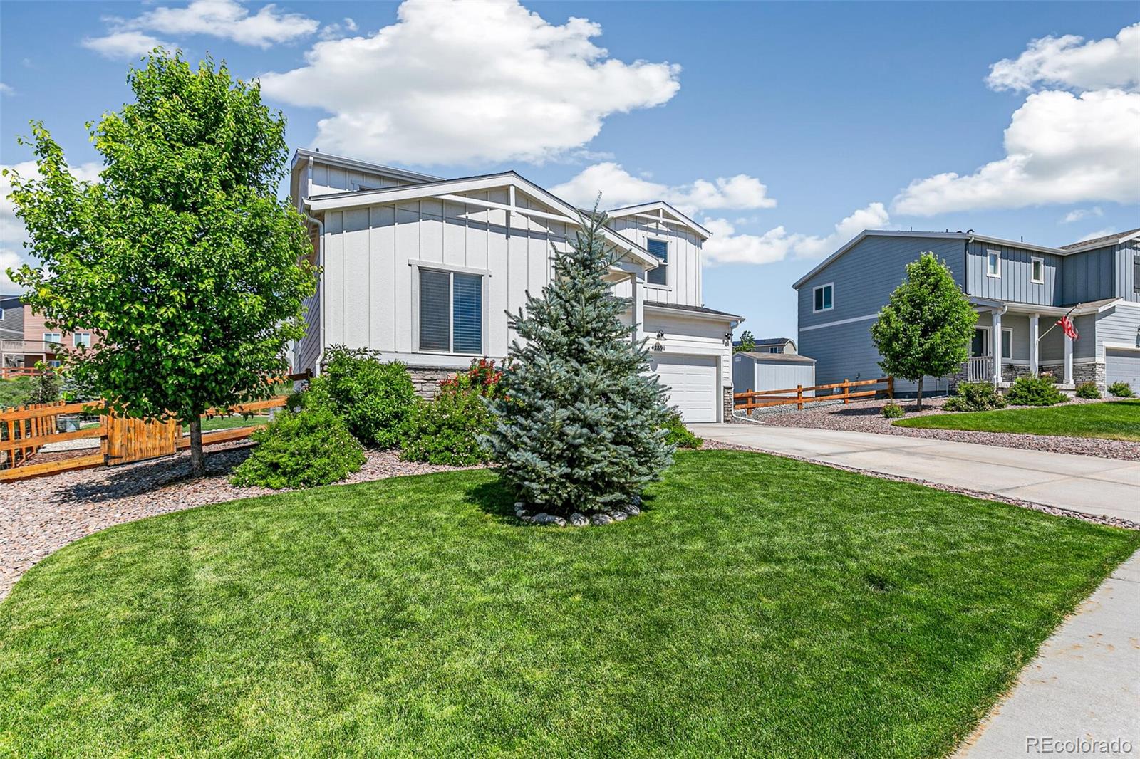 42891 Hawktree Circle Elizabeth, CO 80107 - Photo 30 of 39 a view of a front of a house with a yard
