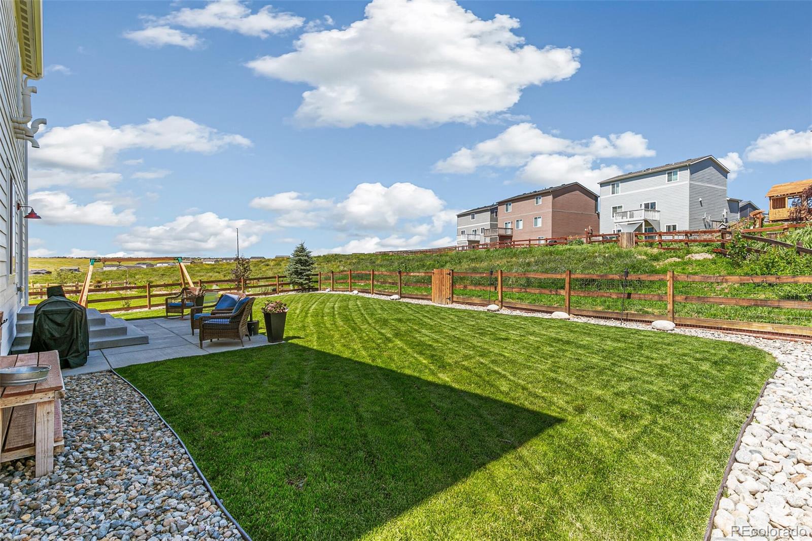 42891 Hawktree Circle Elizabeth, CO 80107 - Photo 36 of 39 a view of a lake with houses