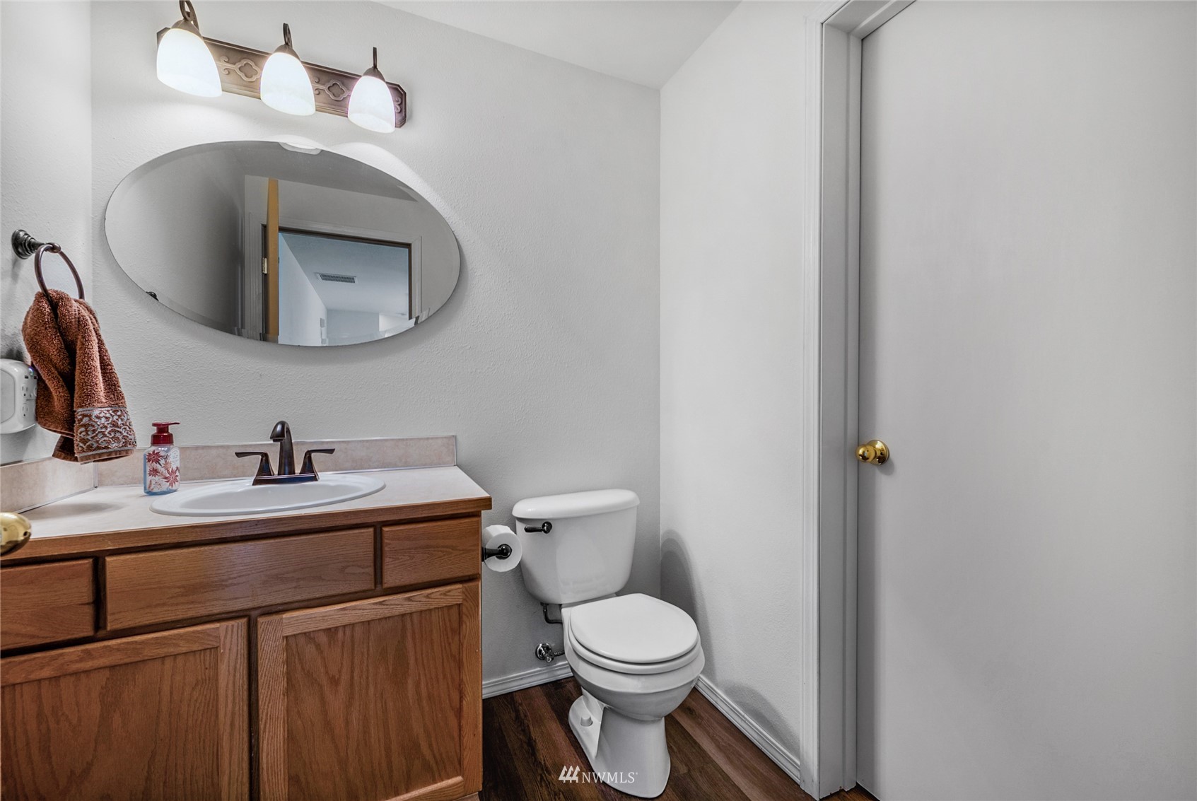 234 17th Street Gold Bar, WA 98251 - Photo 15 of 25 a bathroom with a toilet sink and mirror