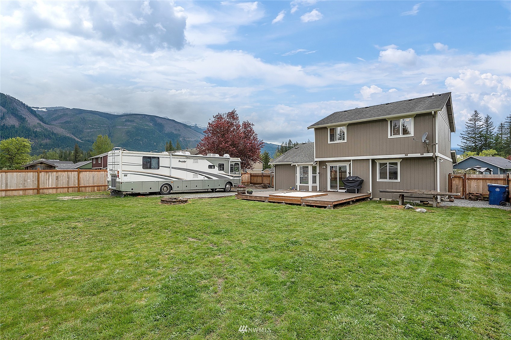 234 17th Street Gold Bar, WA 98251 - Photo 18 of 25 a front view of a house with a garden