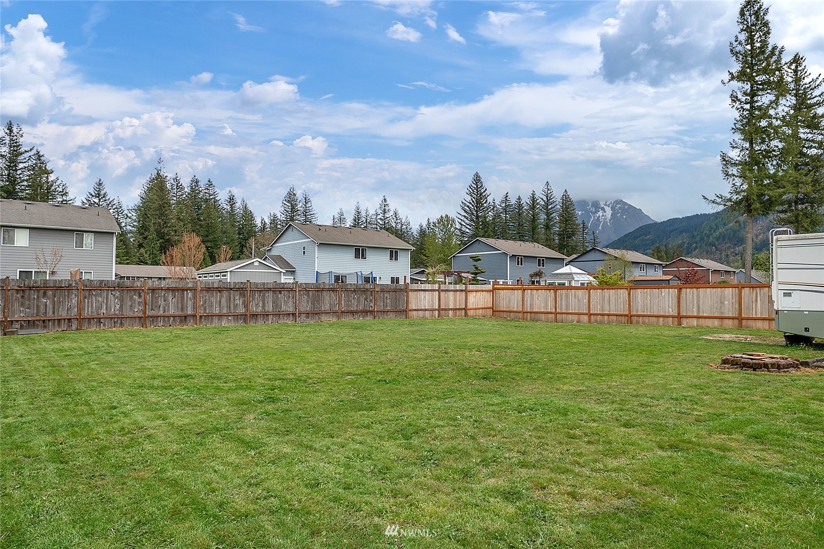 234 17th Street Gold Bar, WA 98251 - Photo 19 of 25 a view of yard with swimming pool and green yard