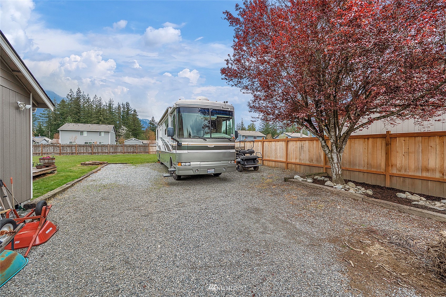 234 17th Street Gold Bar, WA 98251 - Photo 20 of 25 a view of a house with backyard and sitting area