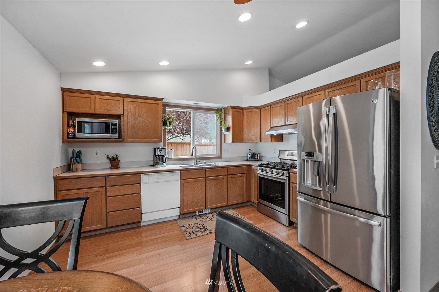 234 17th Street Gold Bar, WA 98251 - Photo 3 of 25 a kitchen with stainless steel appliances a refrigerator stove microwave and sink