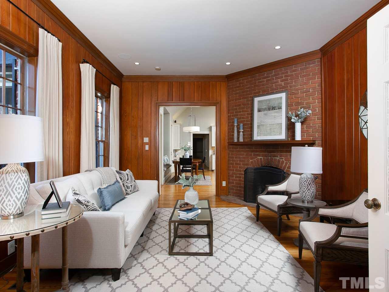 1528 Pinecrest Road Durham, NC 27705 - Photo 13 of 30 a living room with furniture and a fireplace