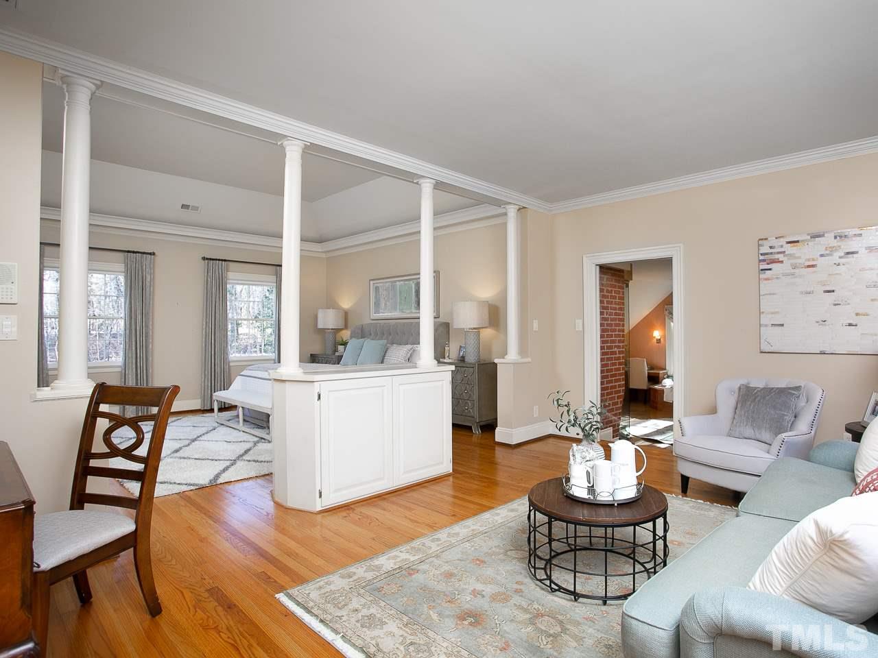 1528 Pinecrest Road Durham, NC 27705 - Photo 16 of 30 a living room with furniture and a wooden floor
