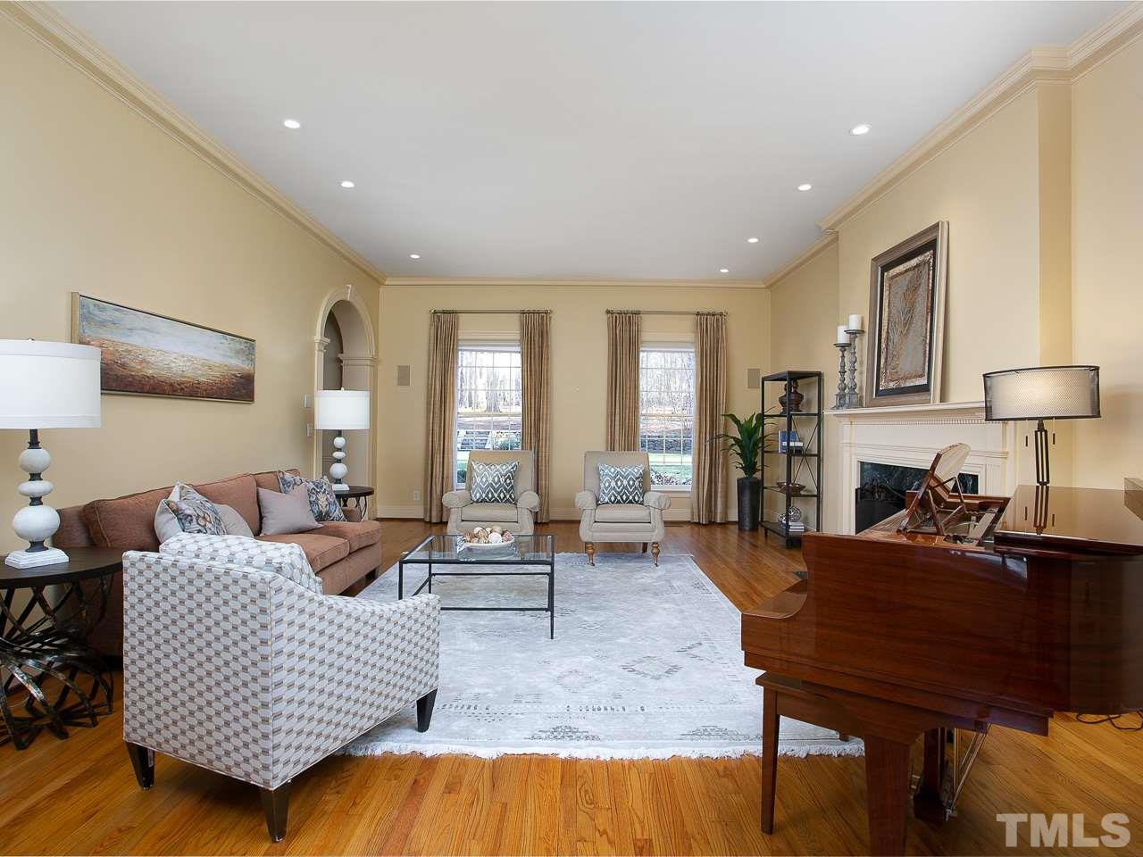1528 Pinecrest Road Durham, NC 27705 - Photo 3 of 30 a living room with furniture and wooden floor
