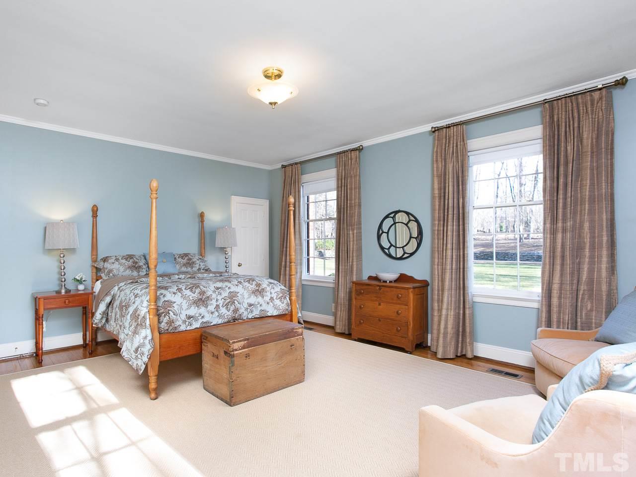 1528 Pinecrest Road Durham, NC 27705 - Photo 22 of 30 a bedroom with bed and window