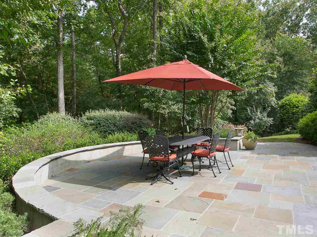 1528 Pinecrest Road Durham, NC 27705 - Photo 29 of 30 an outdoor sitting area with an umbrella