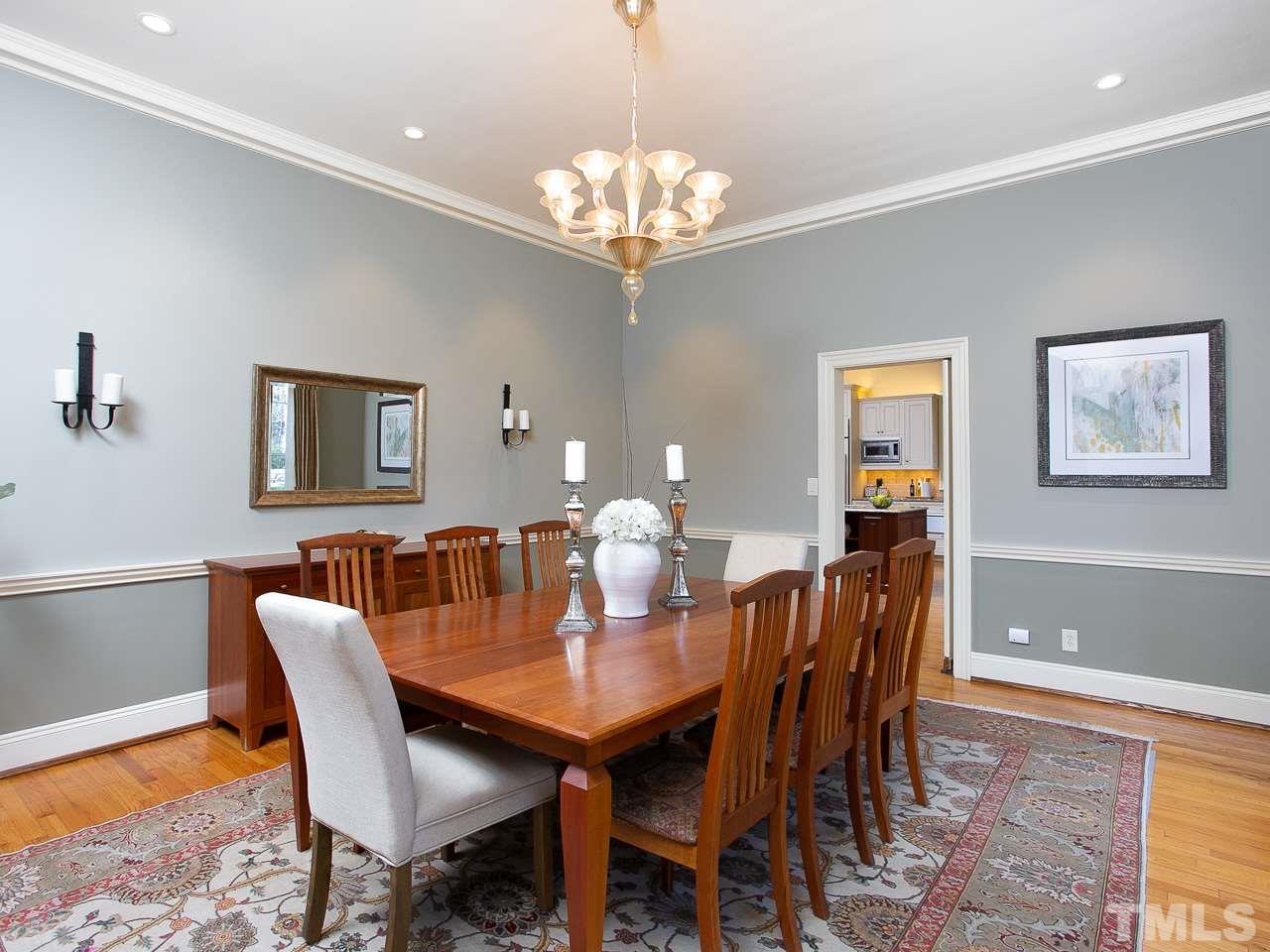 1528 Pinecrest Road Durham, NC 27705 - Photo 10 of 30 a view of a dining room with furniture and chandelier