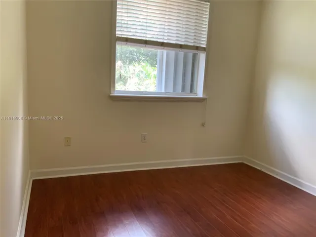 a bathroom with a blue tub