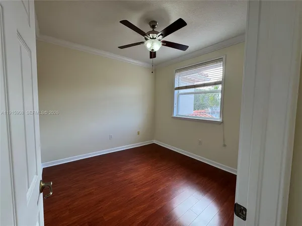 a view of an entryway with a chandelier