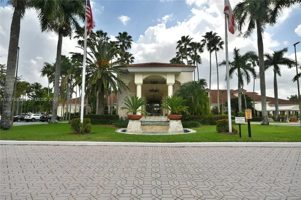 a view of outdoor space with palm trees