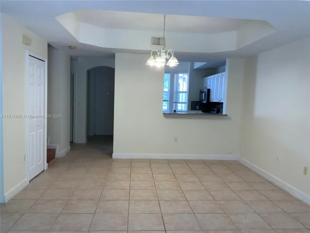 a kitchen with a stove and a microwave