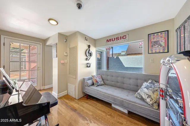 a living room with furniture and a window
