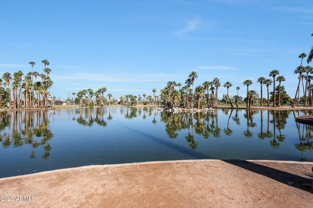 a view of a golf course with a lake