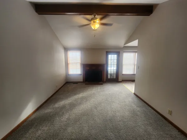 a kitchen with a sink cabinets and window