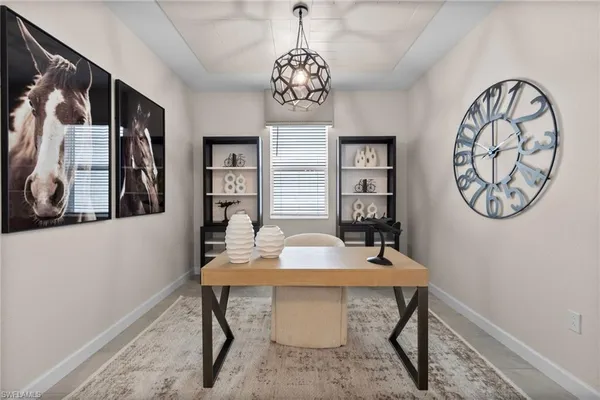 a view of a dining room with furniture