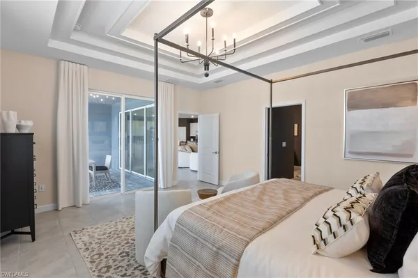 a bedroom with a bed and a walk in closet