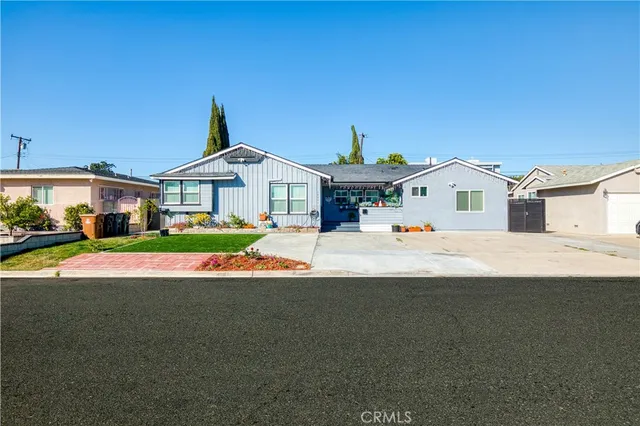 a view of house with outdoor space and view of house