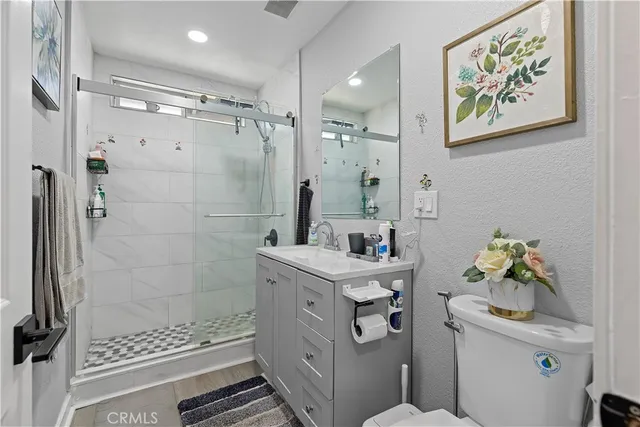 a bedroom with furniture and window