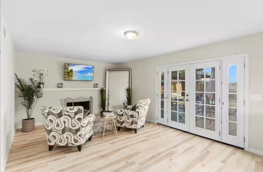 409 Pesca Court Spring Valley, CA 91977 - Photo 4 of 28 a living room with furniture and wooden floor