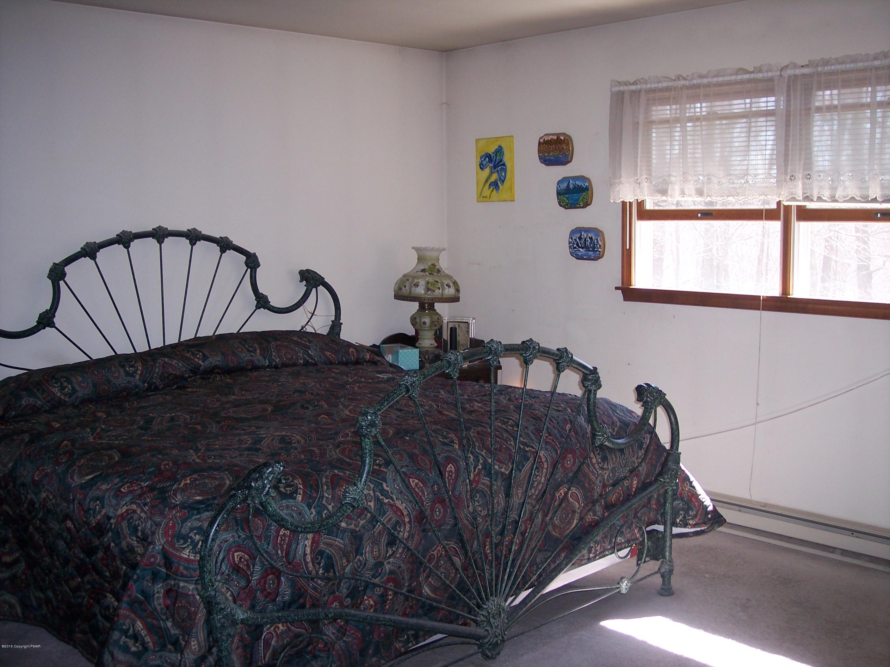 220 Mohican Road Canadensis, PA 18325 - Photo 13 of 36 Master Bedroom