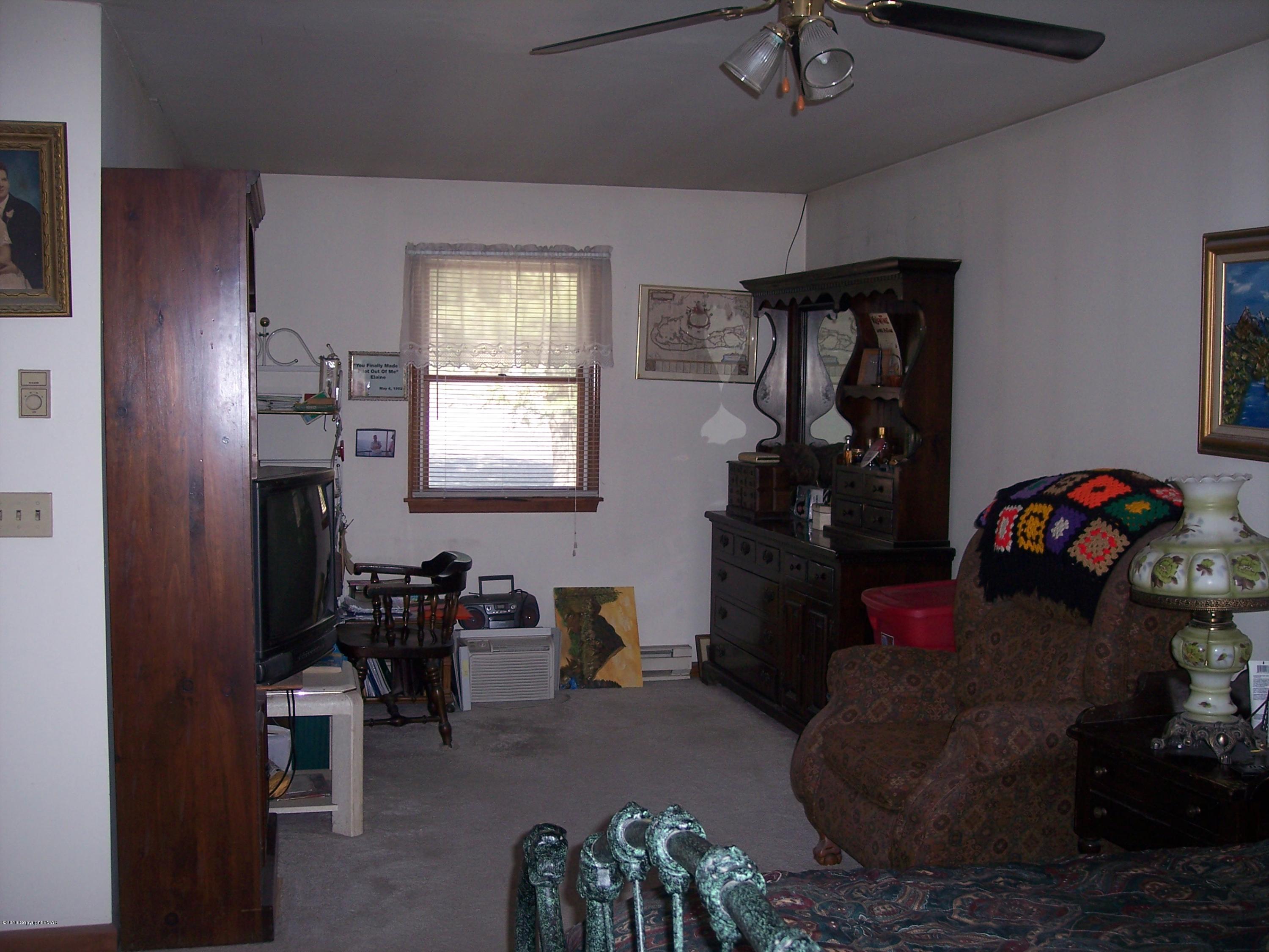 220 Mohican Road Canadensis, PA 18325 - Photo 14 of 36 Master Bedroom Sitting Area