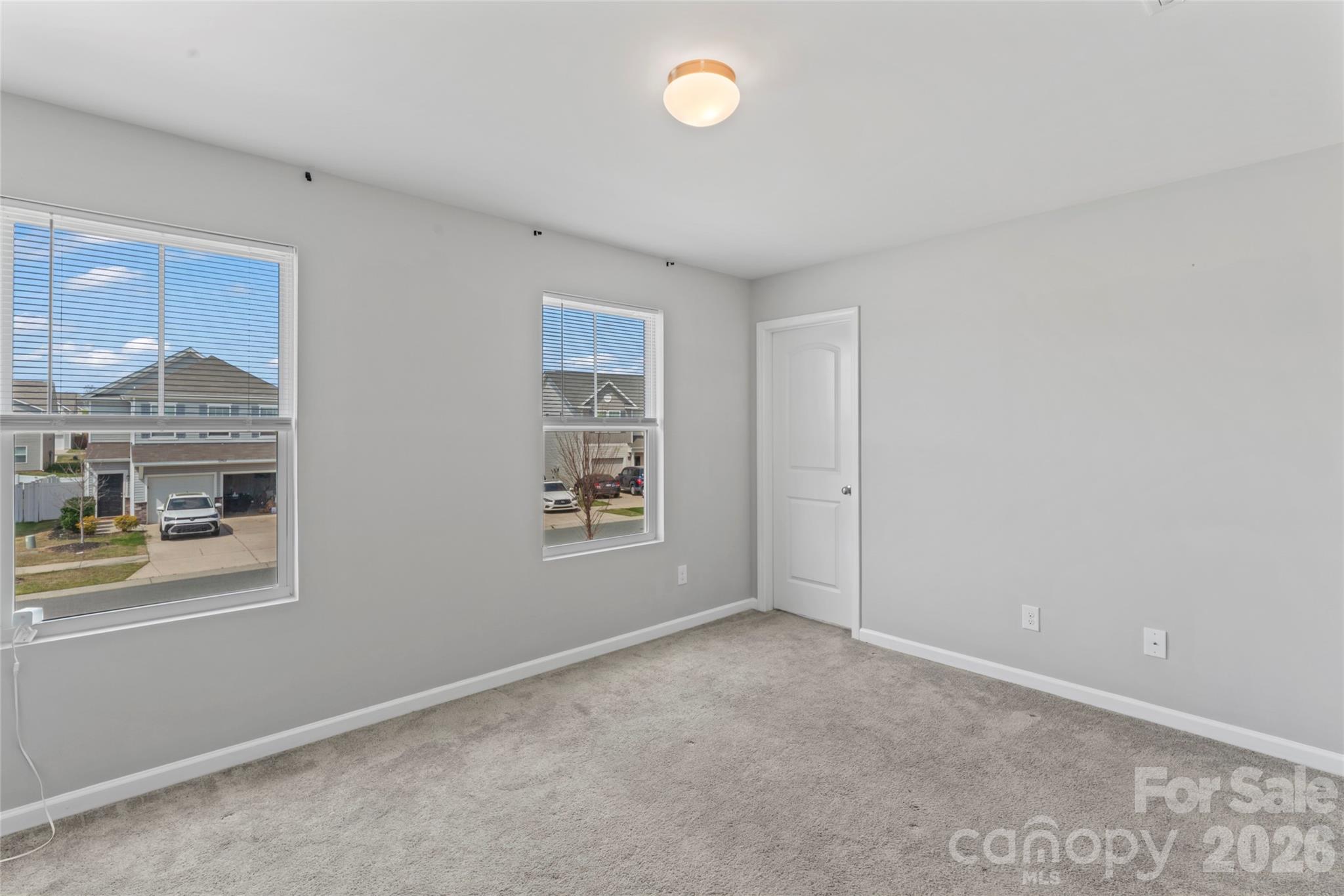 12561 Garron Road Midland, NC 28107 - Photo 14 of 36 a view of an empty room with a window