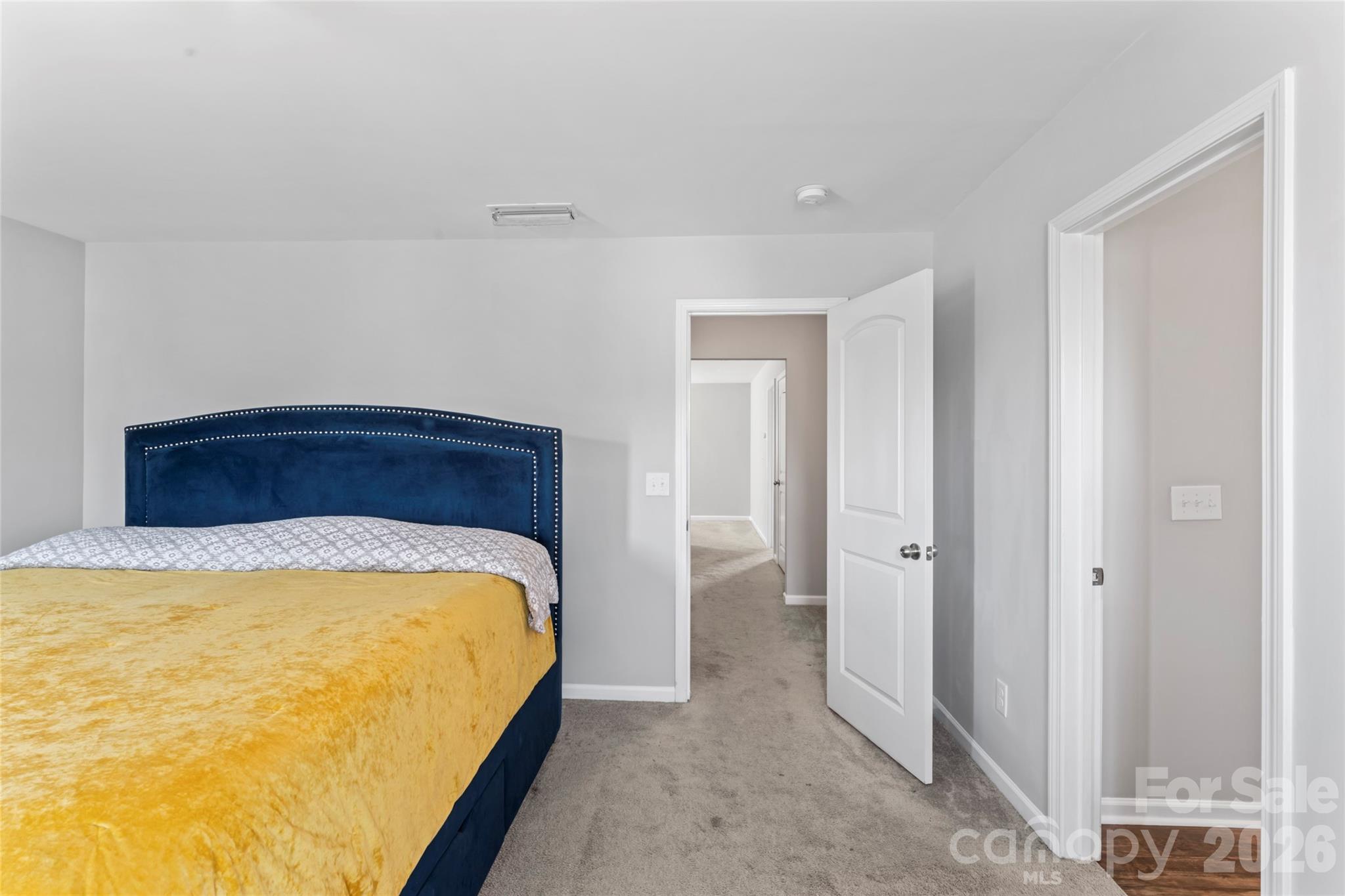 12561 Garron Road Midland, NC 28107 - Photo 17 of 36 a bed sitting in a bedroom and closet