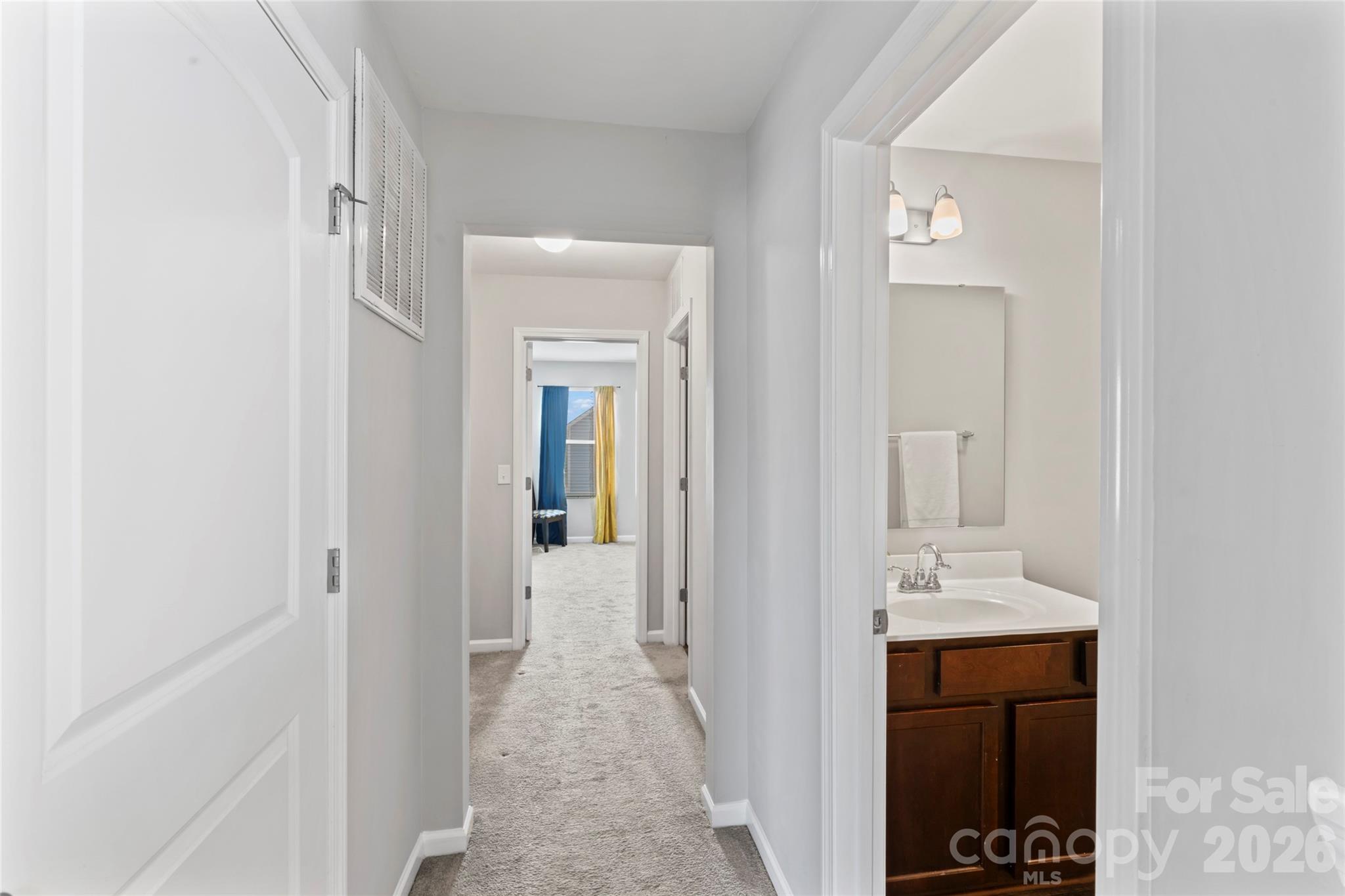 12561 Garron Road Midland, NC 28107 - Photo 18 of 36 a view of a bathroom from the hallway