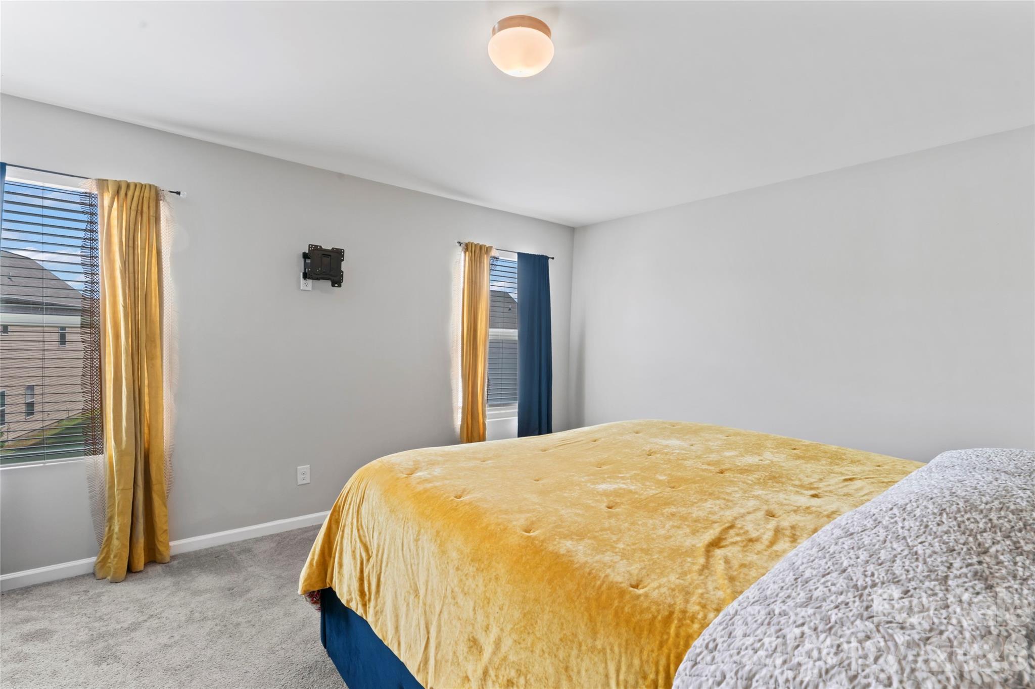 12561 Garron Road Midland, NC 28107 - Photo 19 of 36 a bedroom with a bed and a window