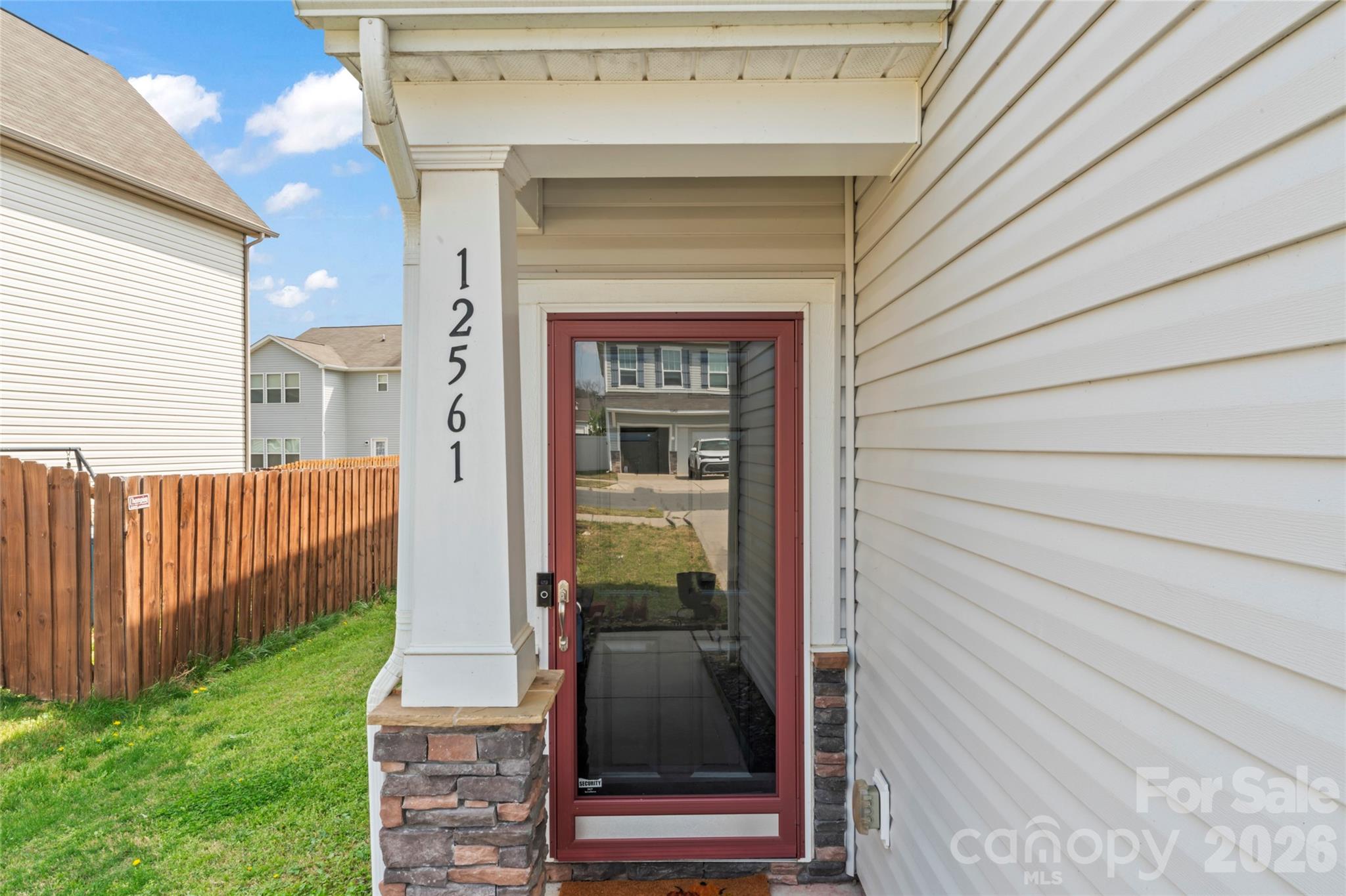 12561 Garron Road Midland, NC 28107 - Photo 2 of 36 a front view of a house with a garden