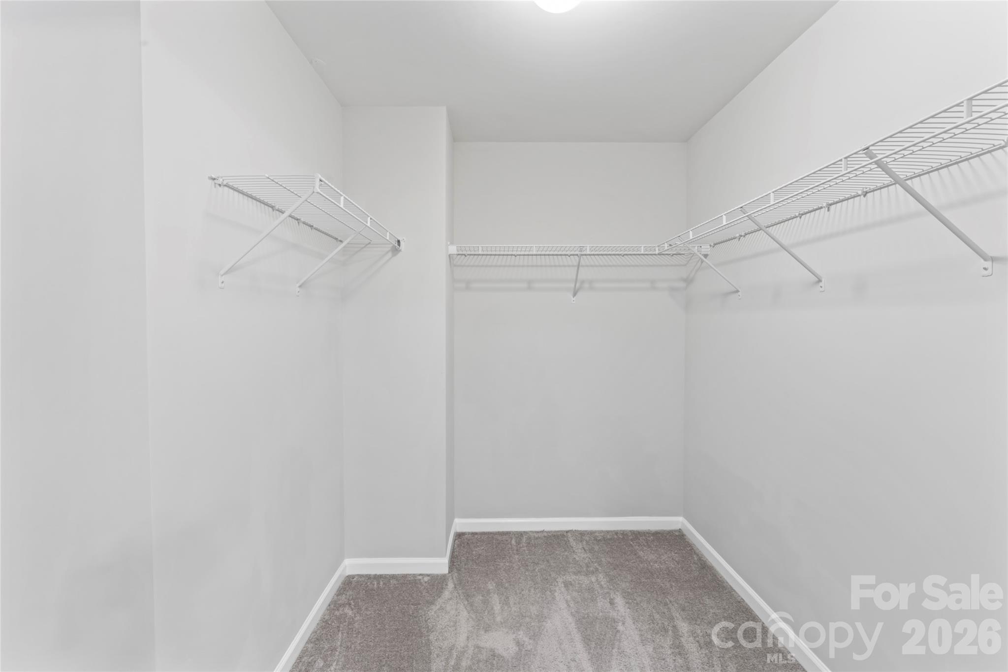 12561 Garron Road Midland, NC 28107 - Photo 24 of 36 a view of a room with racks on the wall