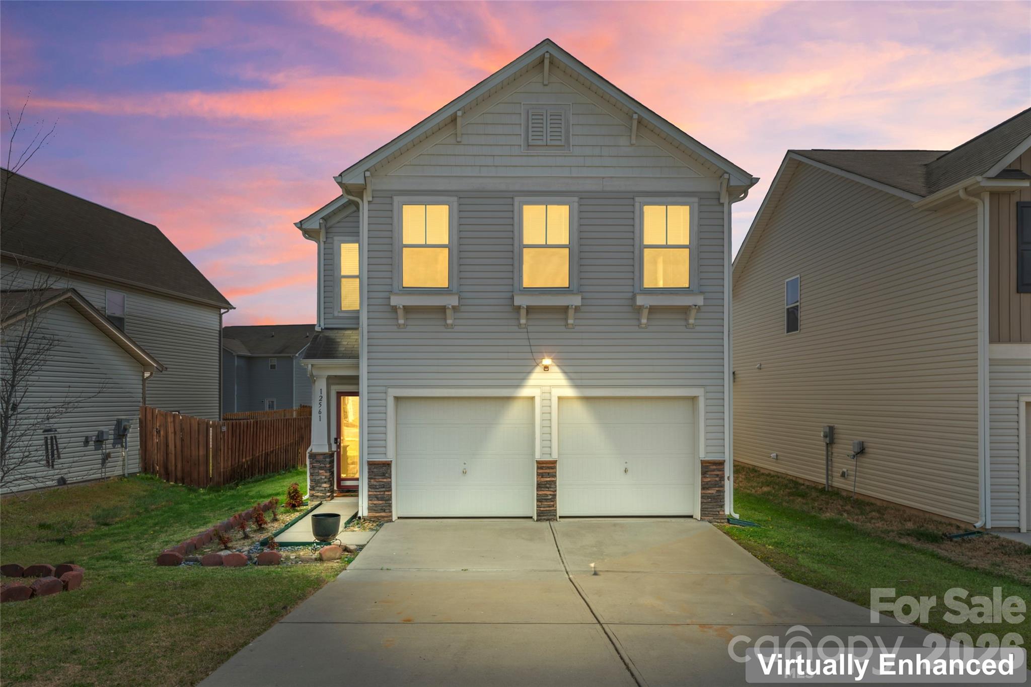 12561 Garron Road Midland, NC 28107 - Photo 4 of 36 a front view of a house with garden