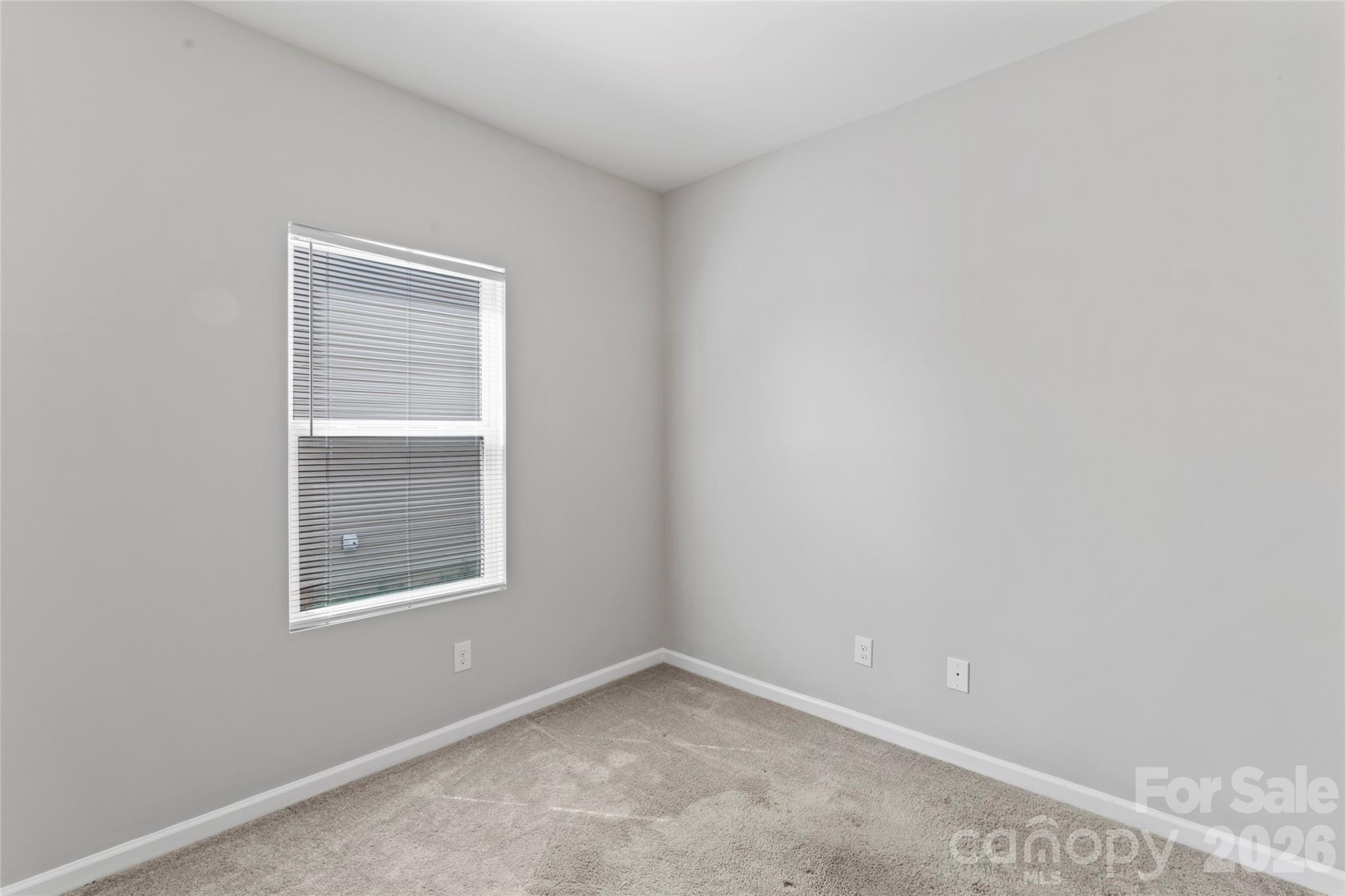 12561 Garron Road Midland, NC 28107 - Photo 7 of 36 an empty room with a window