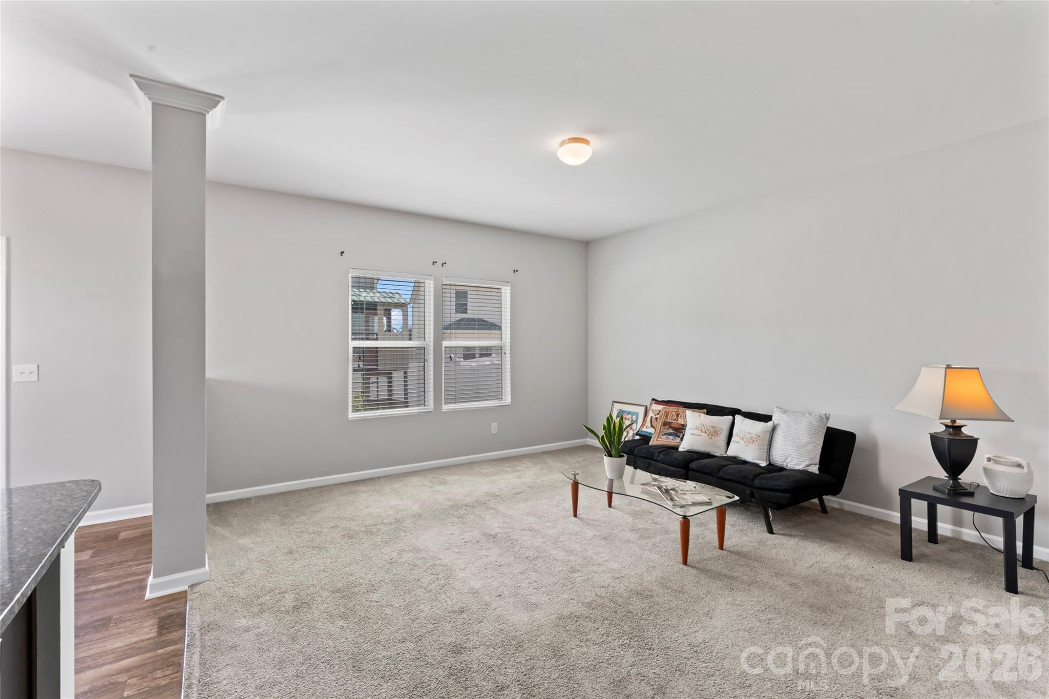 12561 Garron Road Midland, NC 28107 - Photo 8 of 36 a living room with furniture and a window
