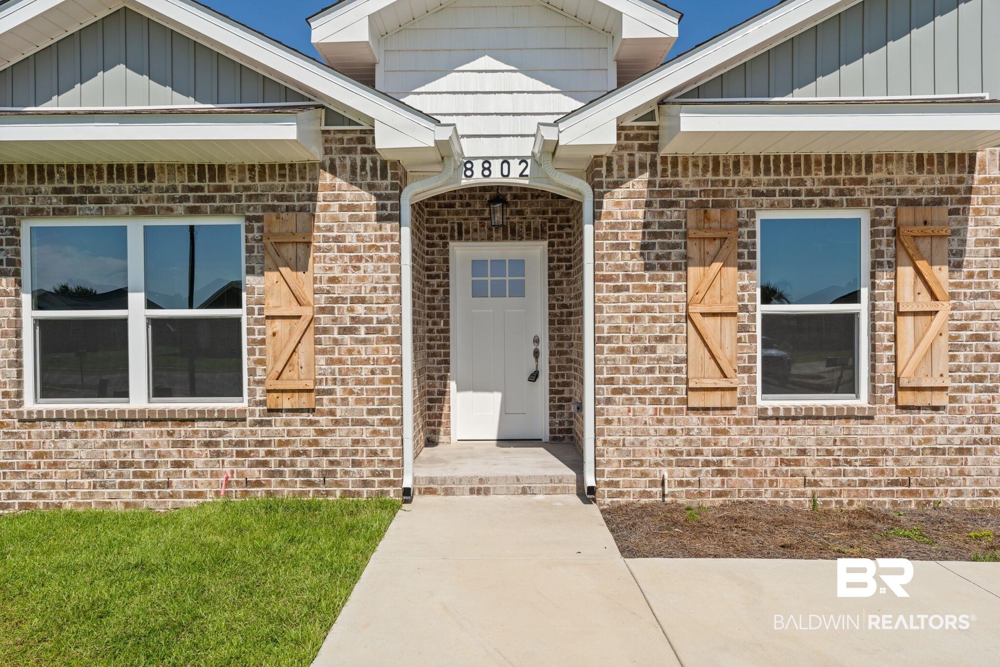 8802 Milners Court Foley, AL 36535 - Photo 4 of 29 Doorway to property featuring brick siding