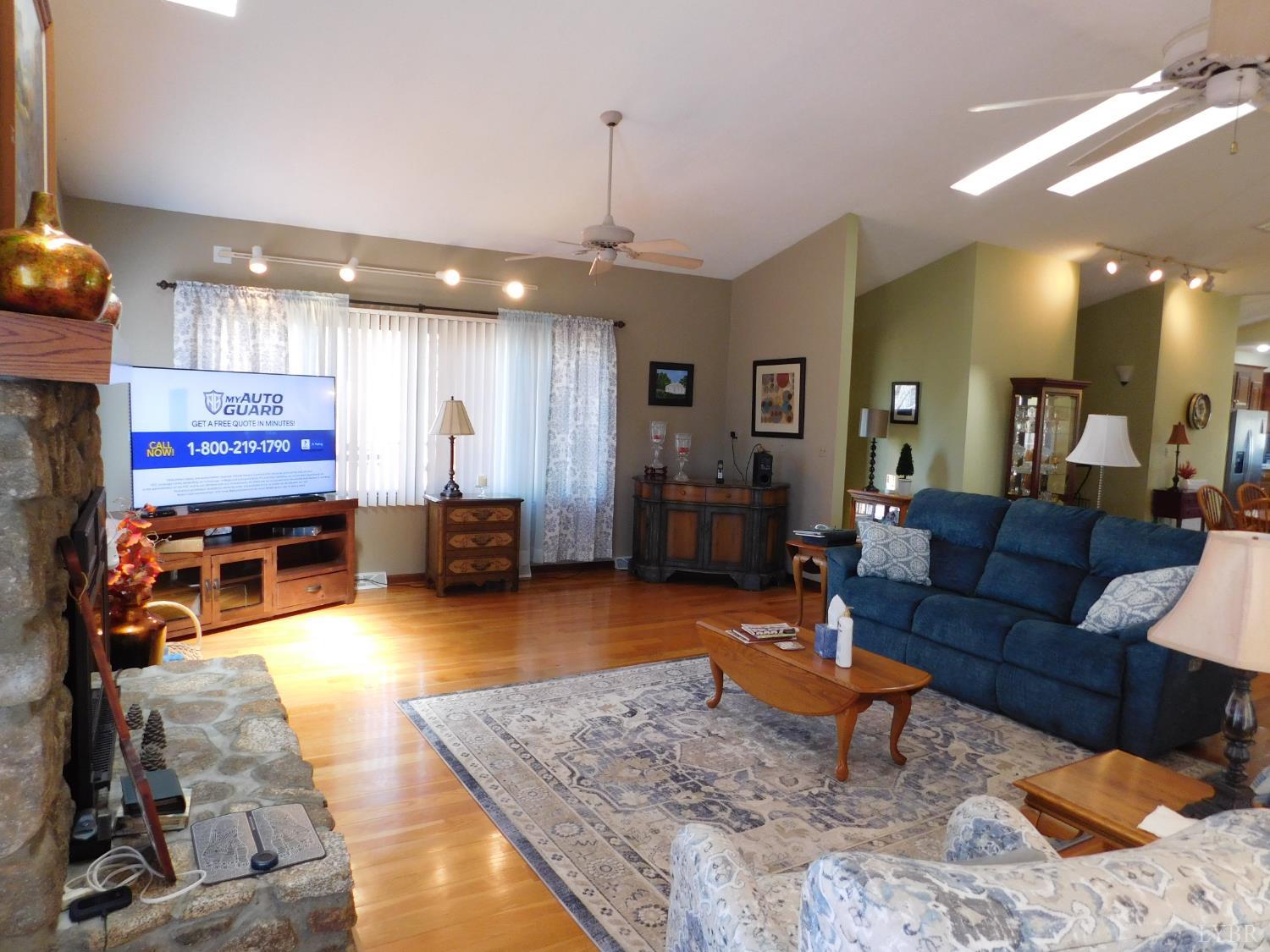 320 Ruth Drive Madison Heights, VA 24572 - Photo 18 of 60 a living room with furniture and a wooden floor